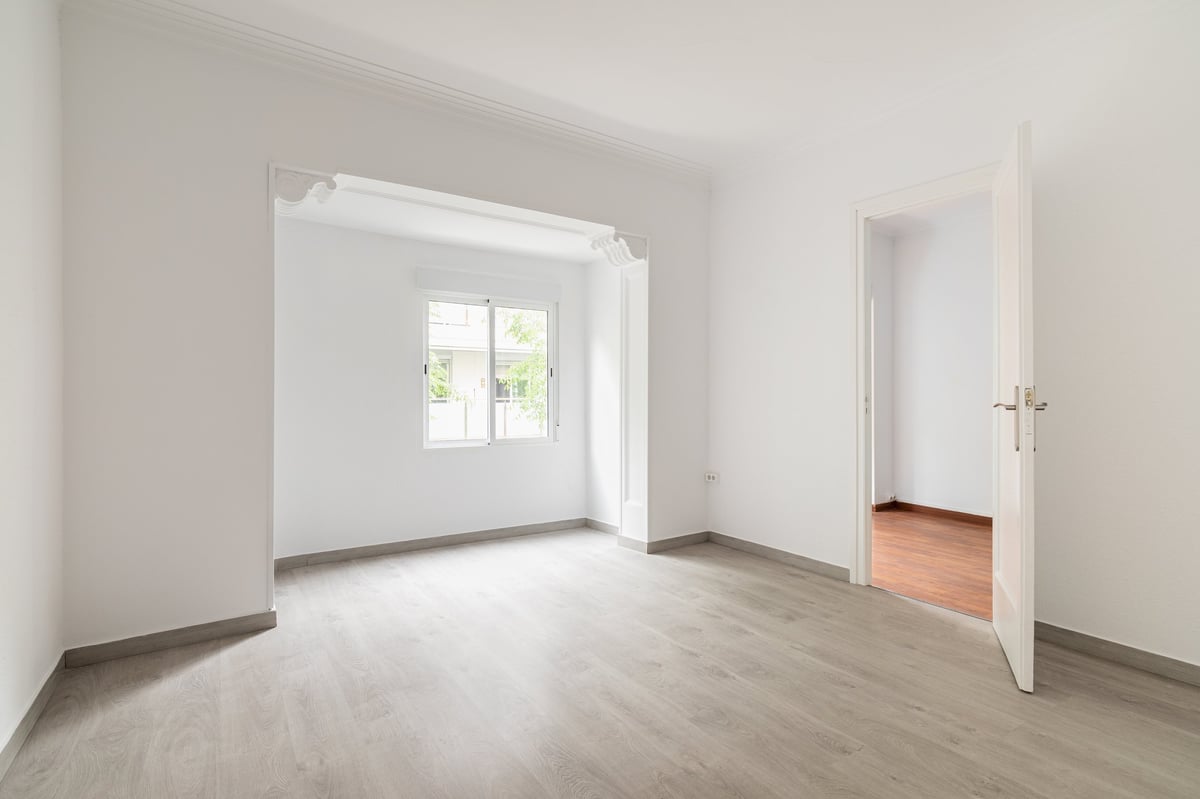 Spacious empty apartment with natural light, ready for move-out cleaning