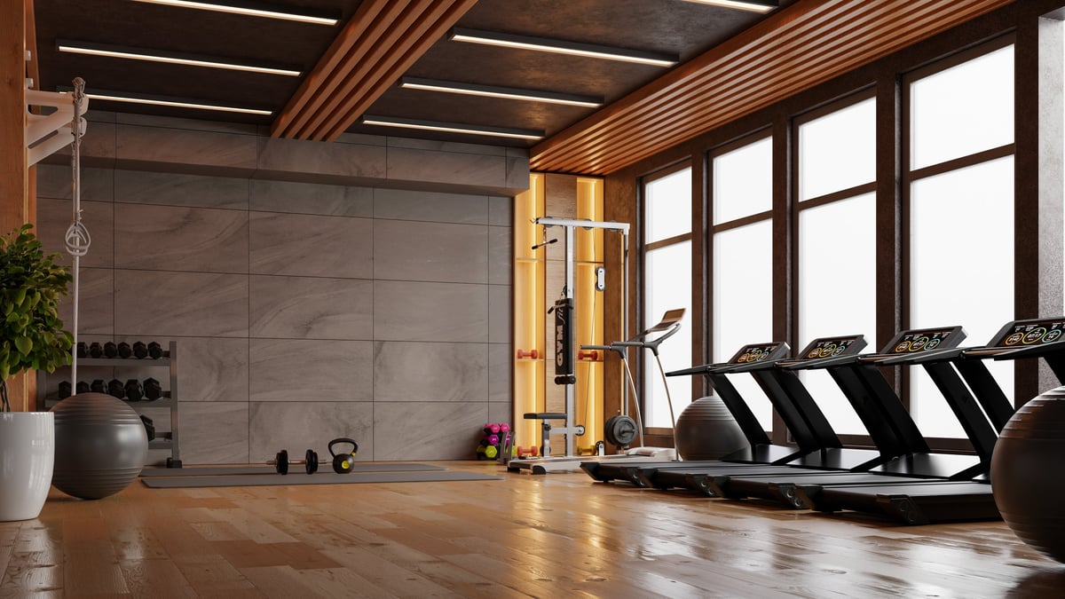 Modern clean fitness center with wooden floors