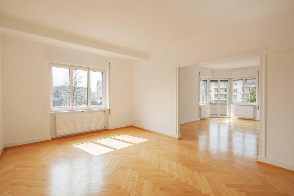 Modern empty apartment interior with large windows